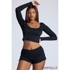 Oh Polly Mid Rise Pointelle Mini Shorts in Black