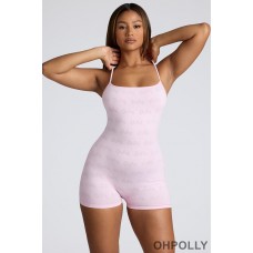 Oh Polly Strappy Low Back Pointelle Romper in Baby Pink